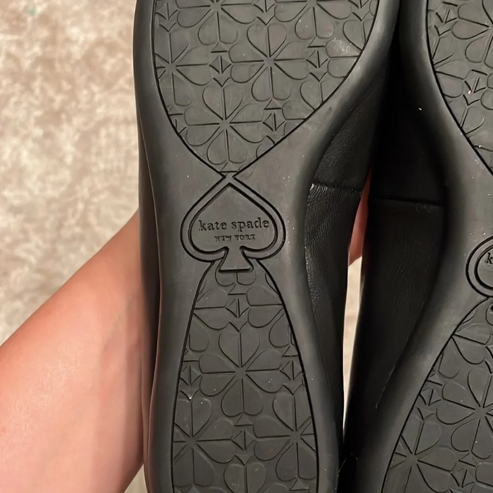 Brand New Kate Spade Genuine Leather Black Flats Slip On Shoes Silver Tone Logo